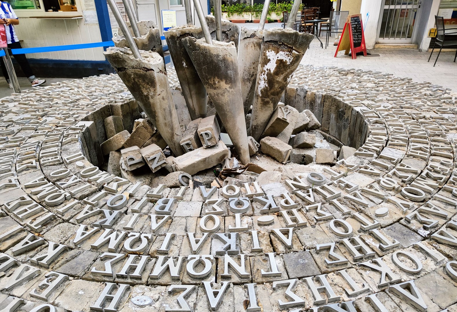 The Statue with Greek letters in Nicosia, at the checkpoint between Turkish and Greek parts of the city.