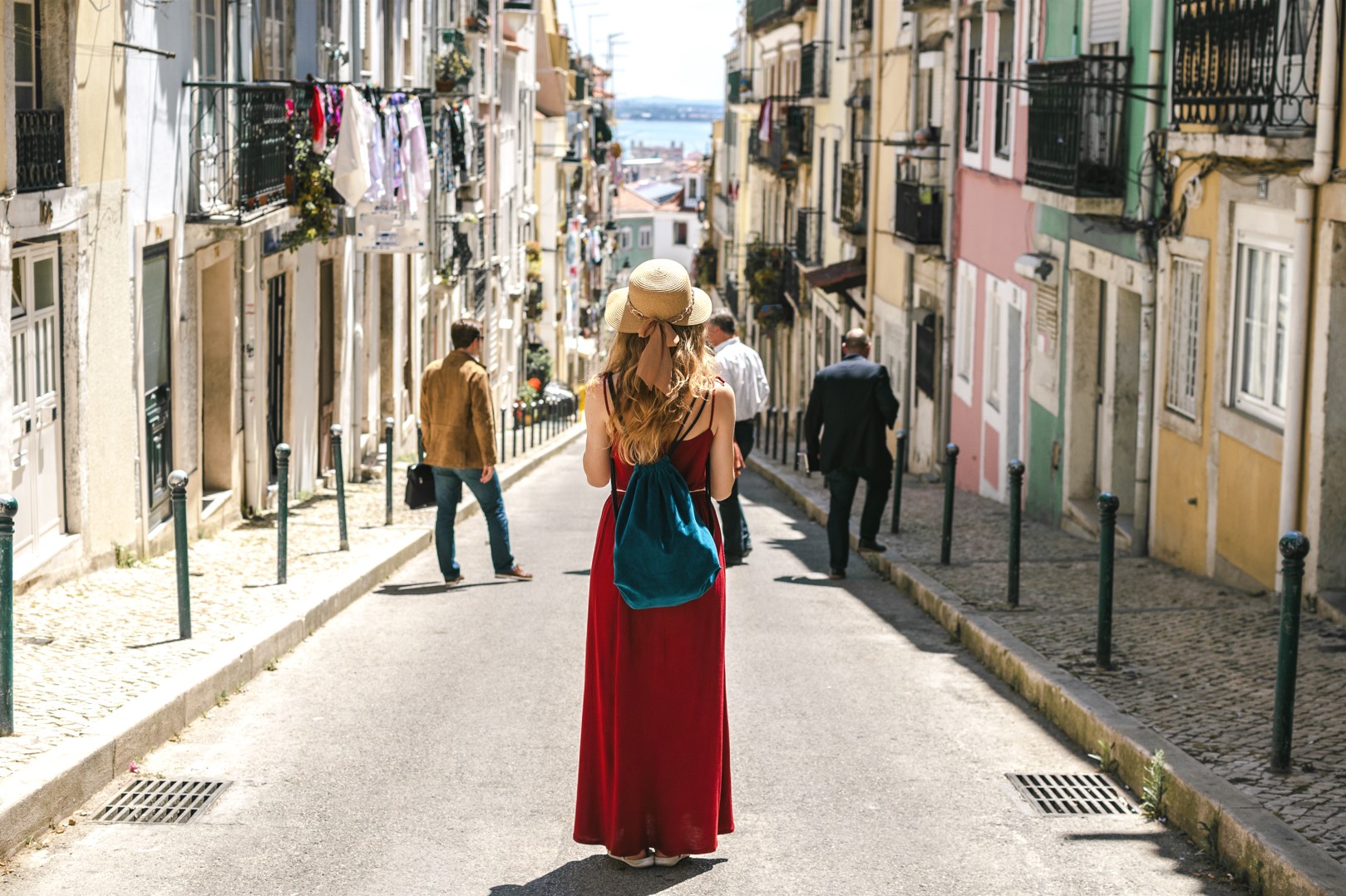 Female traveler walking in Lisbon streets