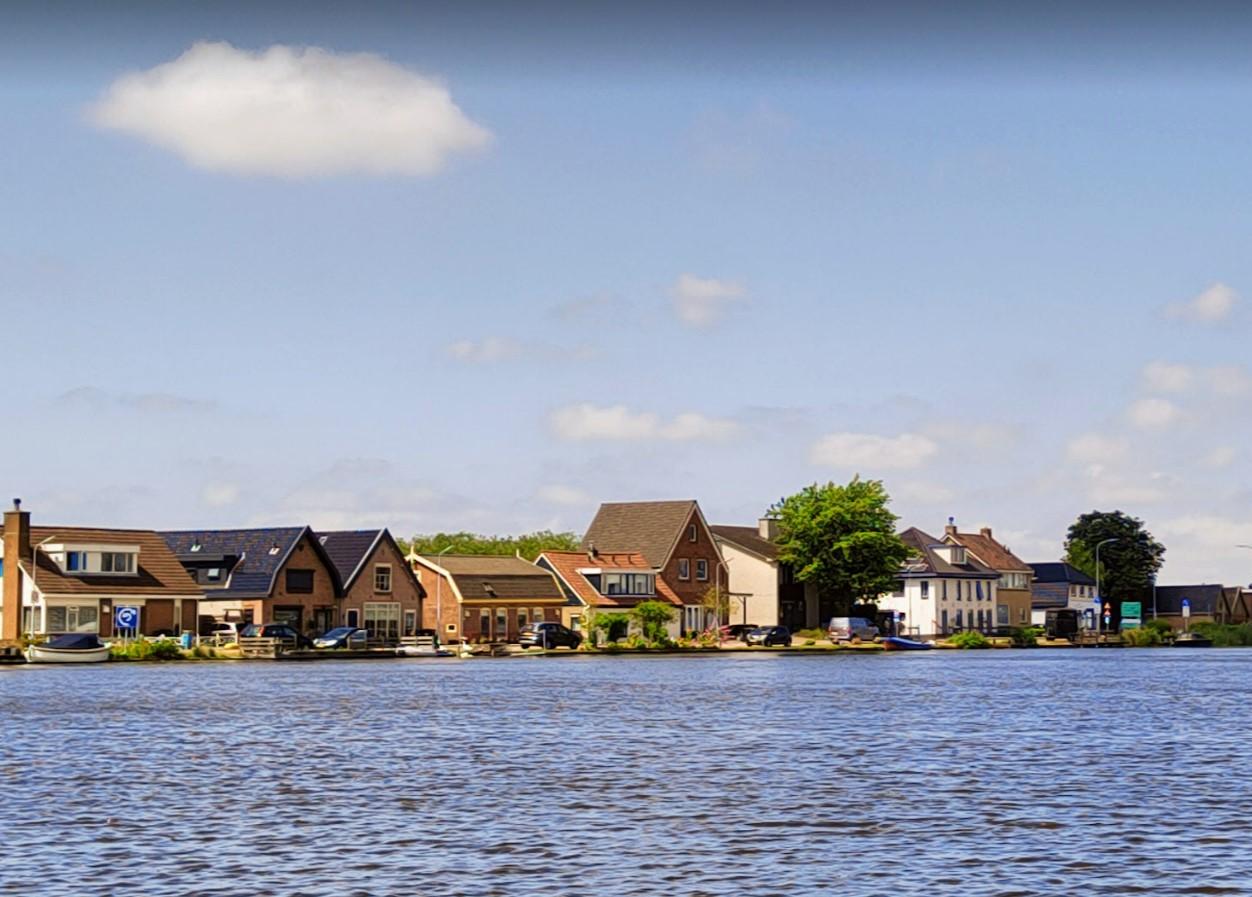 View of Amsterdam from the river. Location Halfweg. Image by Aeronom / PixMeta