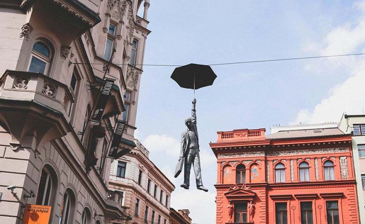 The airborne man hanging from the cables, Prague, Czechia.